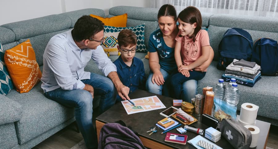 Father showing family where to assemble during an emergency